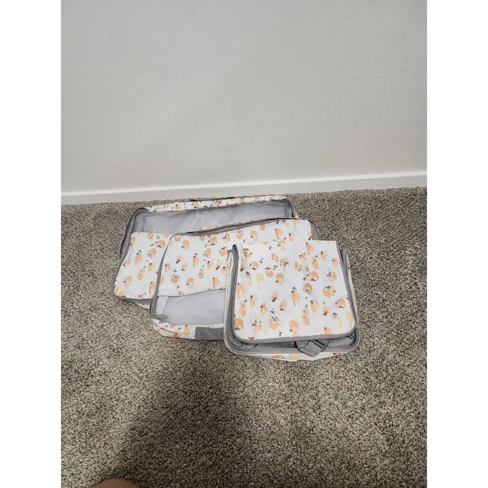 Thirty One white orange 2 packing cubes and toiletry tote